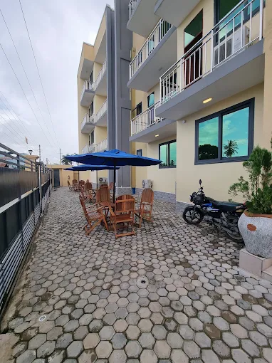 Double Rooms: Furnished with standard bedding options, a work desk, a separate sitting space, and a wardrobe closet.
